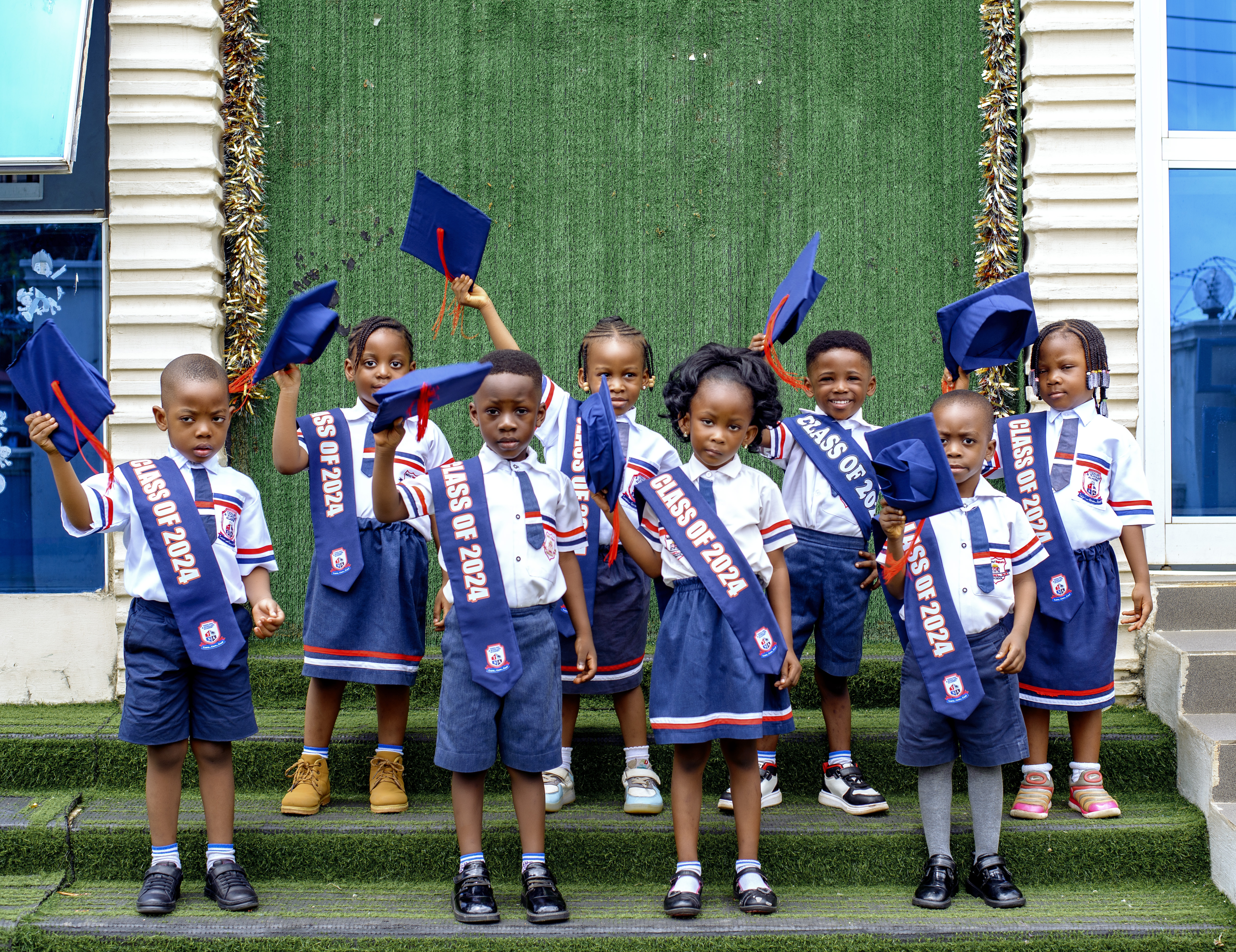 Celebration time — caps in the air