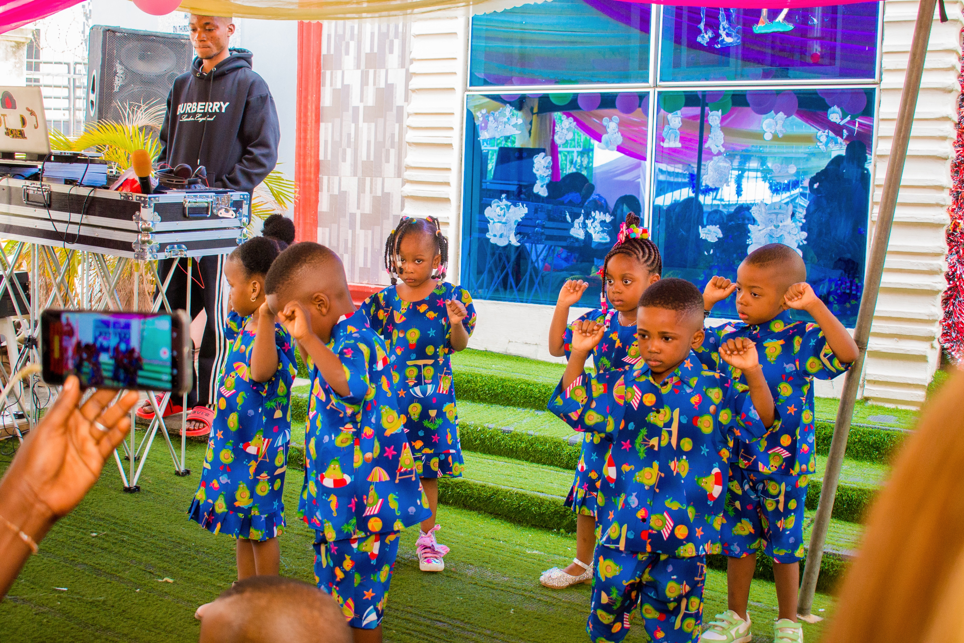 Kids dancing in matching outfits